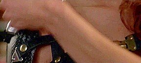 Brunette Lena Olin in lingerie shows off her small tits