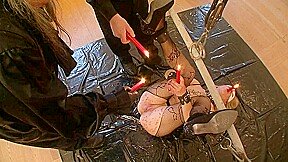 Playing with candles and her pussy