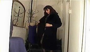 Changing room girl in pantyhose tries on clothes