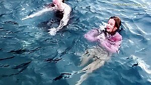 Hot Babes Get Horny In The Sea And Touch Bodies