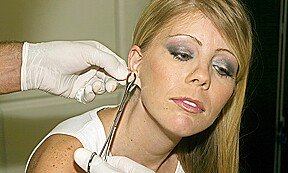 Tiny MILF Tabitha James Gets a Huge Piercing on her Ears – AltErotic