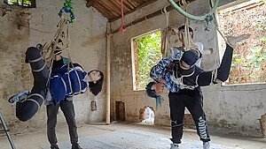 Two Girls Suspended In An Abandoned House