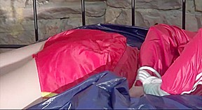 Get 2 Archive Videos With Mara Enjoying Bondage In Her Shiny Nylon Shorts