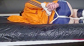 Get 2 Archive-Videos With Lucy Having Fun In Her Shiny Nylon Shorts Beeing Bound And Geggaed