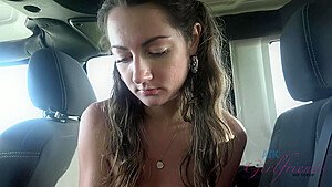 Naughty girl, Lily Adams is sucking dick in the car and rubbing it to make it explode