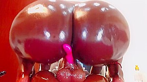 Oily ass on a big dildo