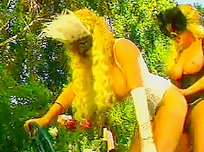 2 big tit lesbians in action outdoors