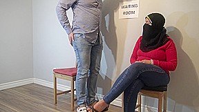 Muslim Woman Cheating in Waiting Room