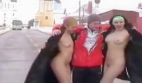Two girls flashing in the snow