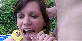 A woman, managing the home, engages in sexual activity with two large, full penises.