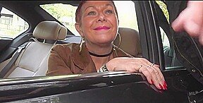 An elder woman engages in a group sexual encounter involving athletic young men.