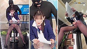 Japanese Babe reading a report with a fixed vibrator in her pussy