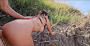 Violated by a massive phallus at an Italian nude shore. Sequence two.