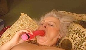 Granny masturbates her huge hairy pussy