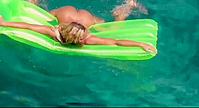 Hot blonde milf naked in ocean on public beach 2